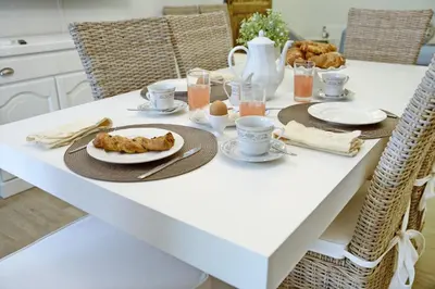 a white table with food on top of it at Villa Rosina in Cinisi
