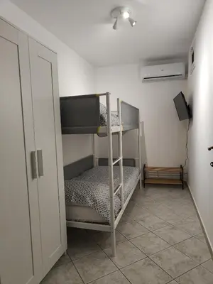 a room with two bunk beds in a room at Casa Josè Suite Mare in Palermo