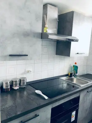 a kitchen with a sink and a counter top at Casa vacanze Rigano Palermo in Palermo