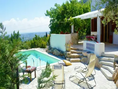 a villa with a swimming pool and a house at Villa Antico Pozzo piscina privata SPA in Castellammare del Golfo