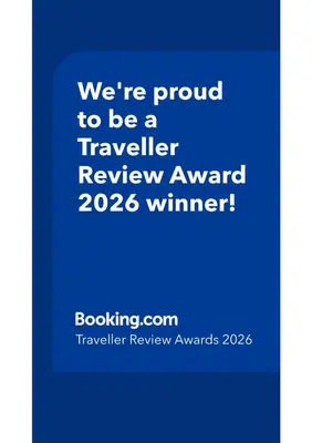 a blue text box with the words were proud to be a traveller reviewanu at Piazza Vittoria Apartment in Carini
