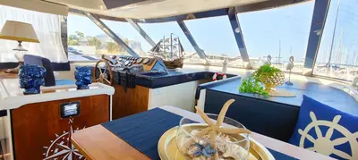a boat room with a table and a counter at Panaby - House Boat in Palermo