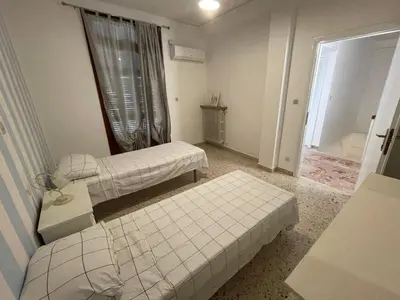a living room with two beds and a window at Dai Maestri Rubino in Vita