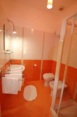 a bathroom with a toilet and a sink at Il Muretto in Lascari
