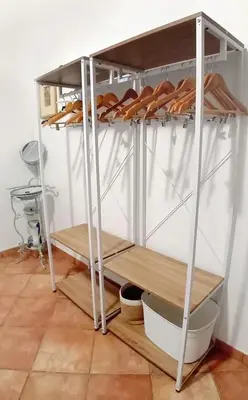 a shelf with a bunch of loaves of bread at Casa Tequi a 200mt dal mare in Terrasini