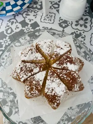 a glass plate with a dessert on a table at Affittacamere Palermo Pirri in Palermo