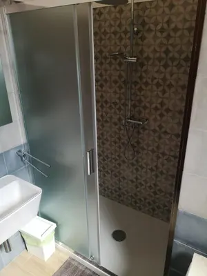 a shower with a glass door in a bathroom at Villa Saracena in Castellammare del Golfo