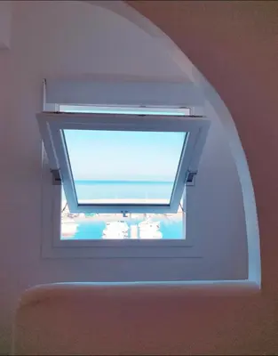 a window in the ceiling of a room at Casa del Pescatore Terrasini in Terrasini
