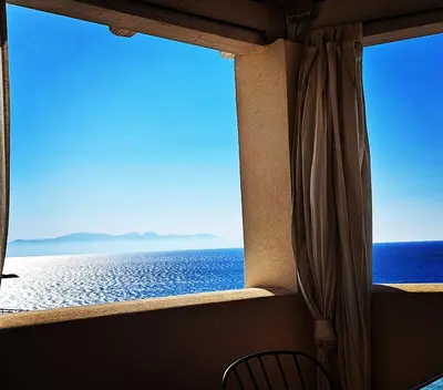 a window with a view of the ocean at Casa del Pescatore Terrasini in Terrasini