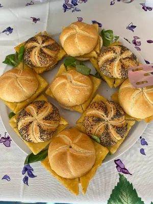 a plate of sandwiches on a table at B&B Le Onde Del Mare in San Vito lo Capo