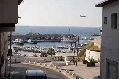 a view of a marina with boats in the water at Matilde’s Holiday House in Terrasini