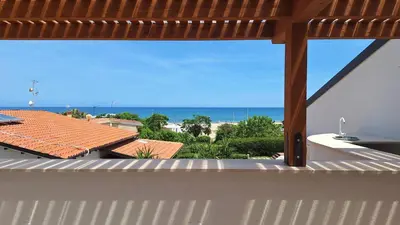 a view of the ocean from the balcony of a house at Casa Vacanze Spiaggia Playa in Castellammare del Golfo