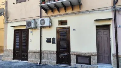 an empty street next to a building at La Casetta Nell' Atrio Cavalieri in Bagheria