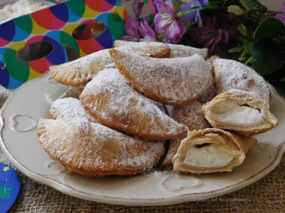 a plate of pastries on a table at Casa vacanze Elisir Del Golfo in Alcamo