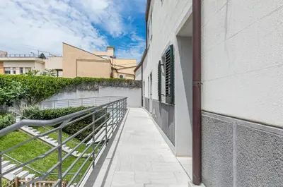 a stairway leading up to a building at GuestHost - Palermo Modern Apartment with Swimming Pool in Palermo