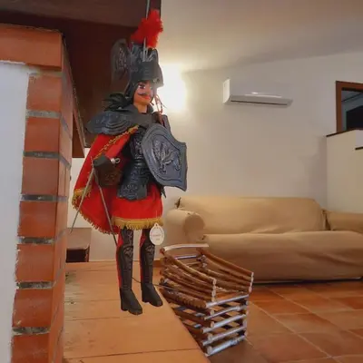 a statue of a person in a living room at La Rosa dei venti in Calatafimi