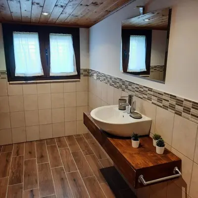 a bathroom with a sink and a mirror at La Rosa dei venti in Calatafimi