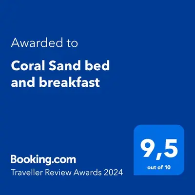 a screenshot of a cell phone with the text awarded to coral sand bed and breakfast at Coral Sand bed and breakfast in San Vito lo Capo