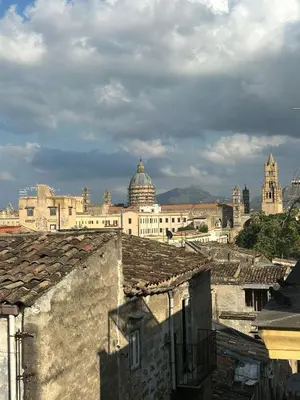 a view of a city with buildings and a dome at Le Trottole Apartment in Palermo