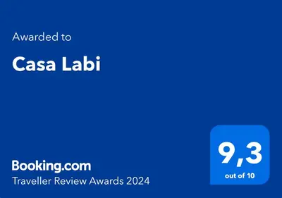 a screenshot of a cell phone with the text upgraded to casa labil transfer at Casa Labi in Termini Imerese