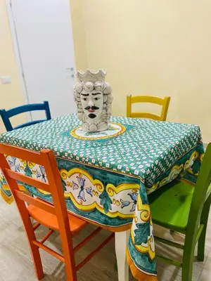 a table with a mask on top of it at A un passo dalla cattedrale in Palermo