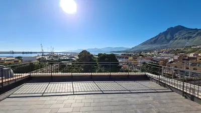 a balcony with a view of a city at Antica Dimora in Termini Imerese