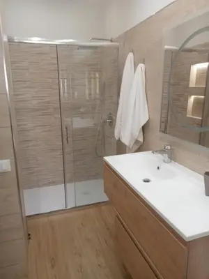 a bathroom with a shower and a sink at La Casetta delle Strelizie in Palermo