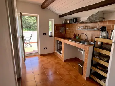 a kitchen with a sink and a counter top at La Porta dei Mori in Palermo