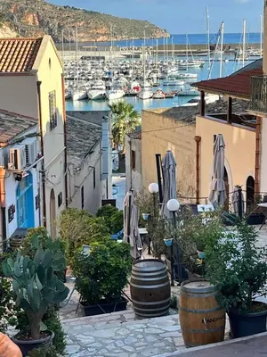 a view of a harbor with boats in the water at Golden House con jacuzzi in Castellammare del Golfo