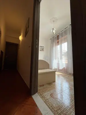 a living room with a tub in the corner of a room at Casa Vacanza Randazzo in Trappeto