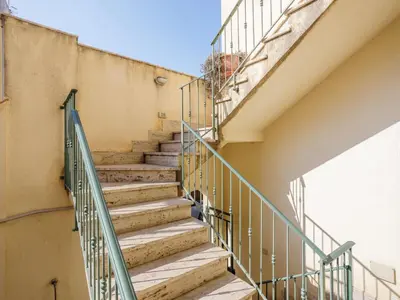 a stairway leading up to a building at Apartment Giardini Gaia by Interhome in San Vito lo Capo
