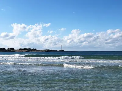 a group of small waves in the ocean at Apartment Giardini Gaia by Interhome in San Vito lo Capo
