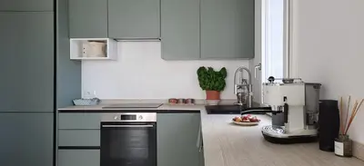 a kitchen with a coffee machine in a kitchen at Villa Ballerina Bianca in Scopello
