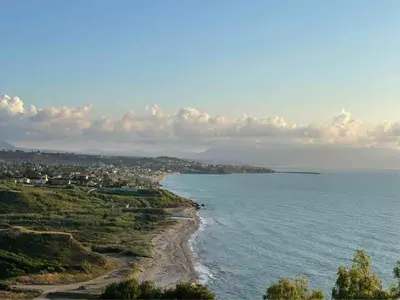 a view of the shoreline of a beach at La Casa di Dada in Terrasini