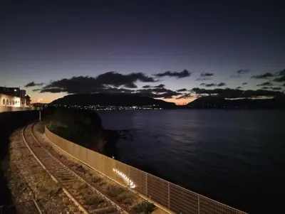 a view of a body of water at night at Finestra sul Mare di Alessandro in Balestrate