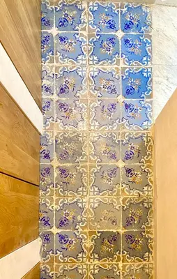 a room with a blue and white tile floor at Casa 900 in Castellammare del Golfo