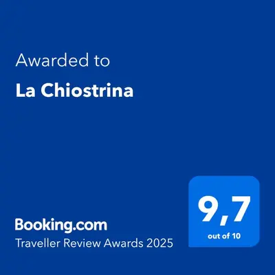 a blue text box with the words awarded to laich institution at La Chiostrina in Castellammare del Golfo