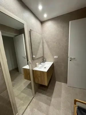a bathroom with a sink and a mirror at Casa vacanze Soraja in Palermo