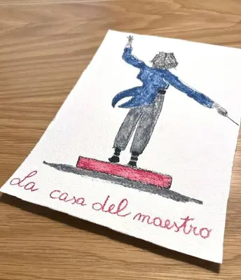 a card with a picture of a person on skis at La casa del Maestro in Palermo