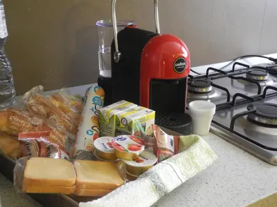 a counter top with a mixer and a tray of food at Prince Moncada in Palermo