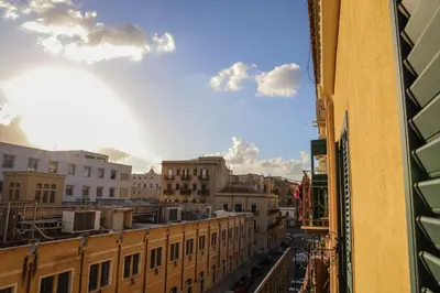 a view from a window of a city with buildings at L'Incanto centrale in Palermo