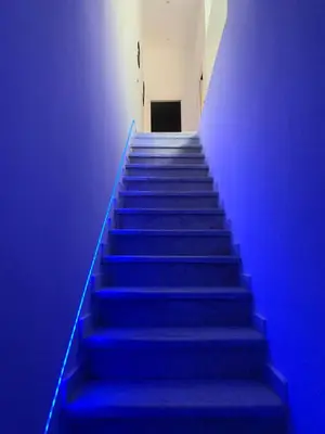 a stair case with blue lights on it at Palermo Wow - Aragona in Palermo