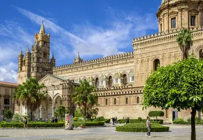 a large building with a tower on top of it at A casa di Alex in Palermo