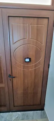 a pair of wooden doors in a room at Il quaRtetto apartment in Palermo