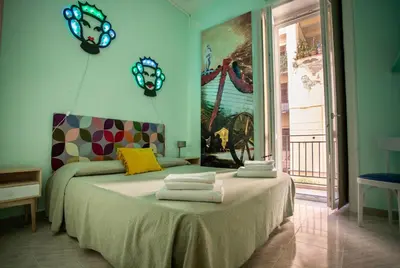 a bedroom with a bed with towels on it at 