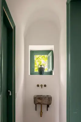 a bathroom with a sink and a window at Villa surrounded by Nature overlooking the Sea - Cefalù in Lascari
