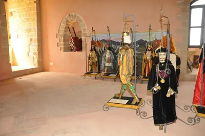 a room with costumes on display in a museum at Villa Letizia in Campofelice di Roccella