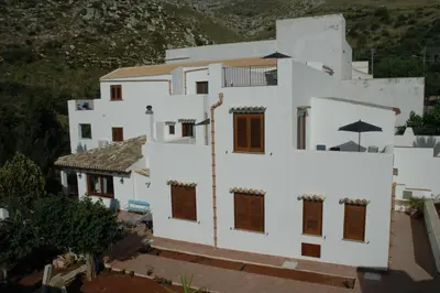 an aerial view of a white building with brown shutters at Punto de Vista B&B Makari in San Vito lo Capo