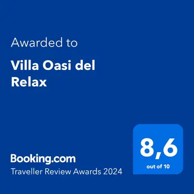 a screenshot of a phone with the text awarded to villa oasis del relax at Villa Oasi del Relax Flavianna in Castellammare del Golfo