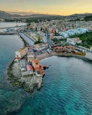 an aerial view of a small island in the water at Casa di Leda in Santa Flavia